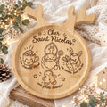 Assiette Saint Nicolas en bois avec bois de renne stylisés et gravures chocolat chaud, âne, carotte et pain d'épices